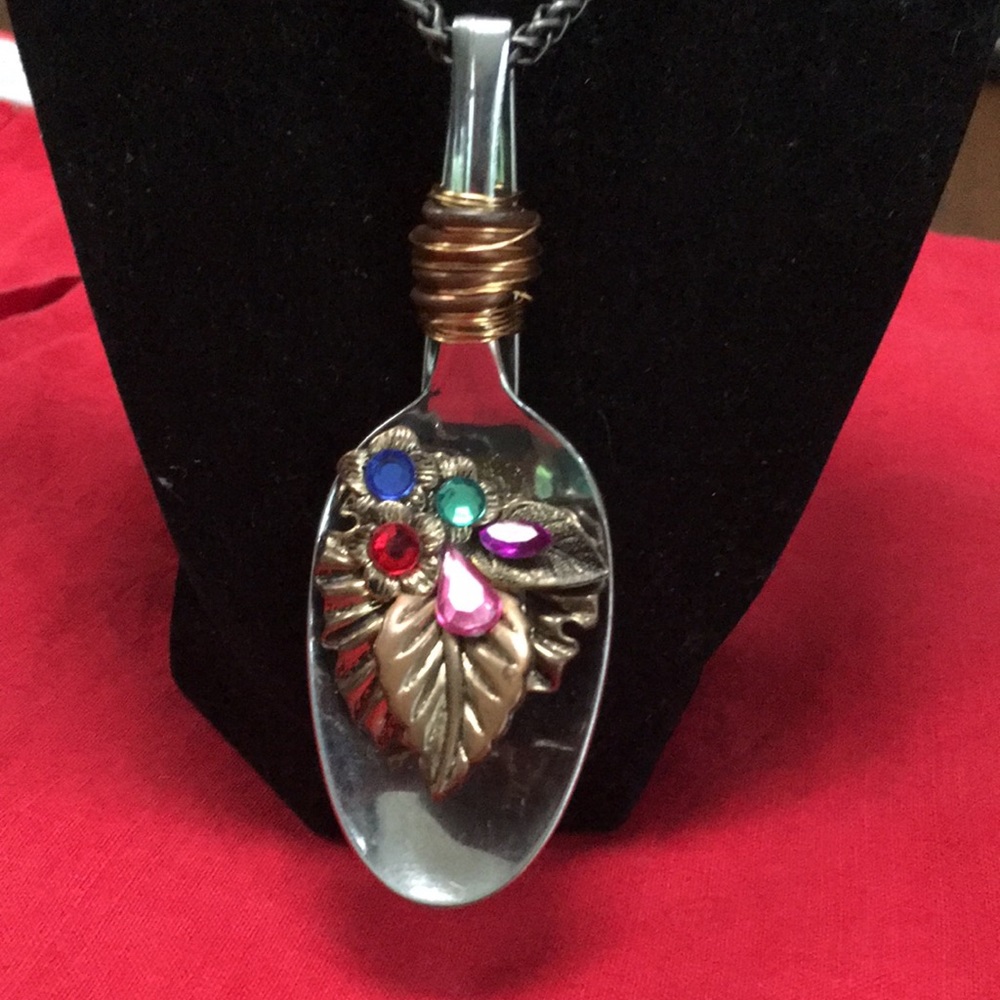Yes, it’s my spoon jewelry!! 14” drop. Spoon with costume jewelry firmly in bowl